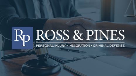 logo over hands shaking